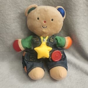 Red and Blue Stuffed Animal with Denim Overalls